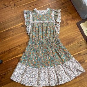 Teal, orange, purple, and white floral dress. Size med.Like new. Only worn once.